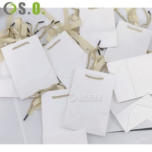 ハンドルが付いている卸売の注文のロゴのボール紙包装の白い高級ギフト ショッピング ジュエリー紙袋